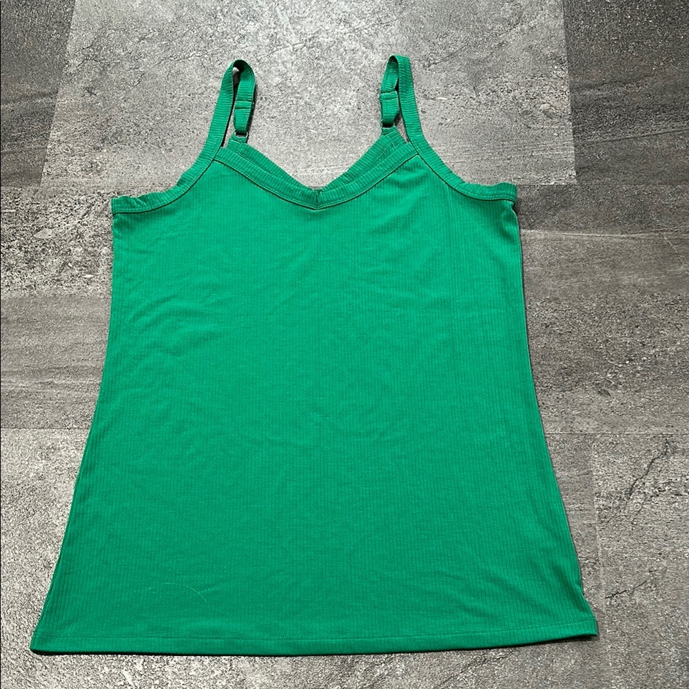 Like new Torrid ribbed tank top with adjustable straps. No holes stains or rips